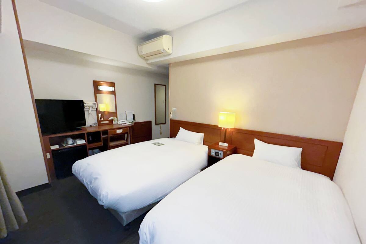 Chambre avec lits jumeaux | Accès au Wi-Fi (inclus), literie fournie