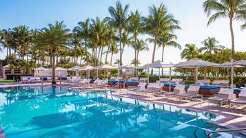 2 outdoor pools, open 7:00 AM to 6:00 PM, pool umbrellas, sun loungers