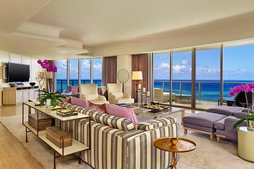 Presidential Suite, 2 Bedrooms, Ocean View | Living room | 42-inch LCD TV with premium channels, TV, DVD player