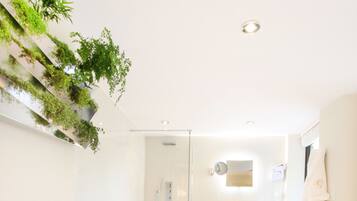Suite, 1 Queen Bed, Terrace | Bathroom | Designer toiletries, hair dryer, bathrobes, slippers