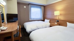 A hotel room with two beds, a desk with a telephone, a television, and a window with curtains. - Hotel Route-Inn Yamagata Ekimae (Yamagata)