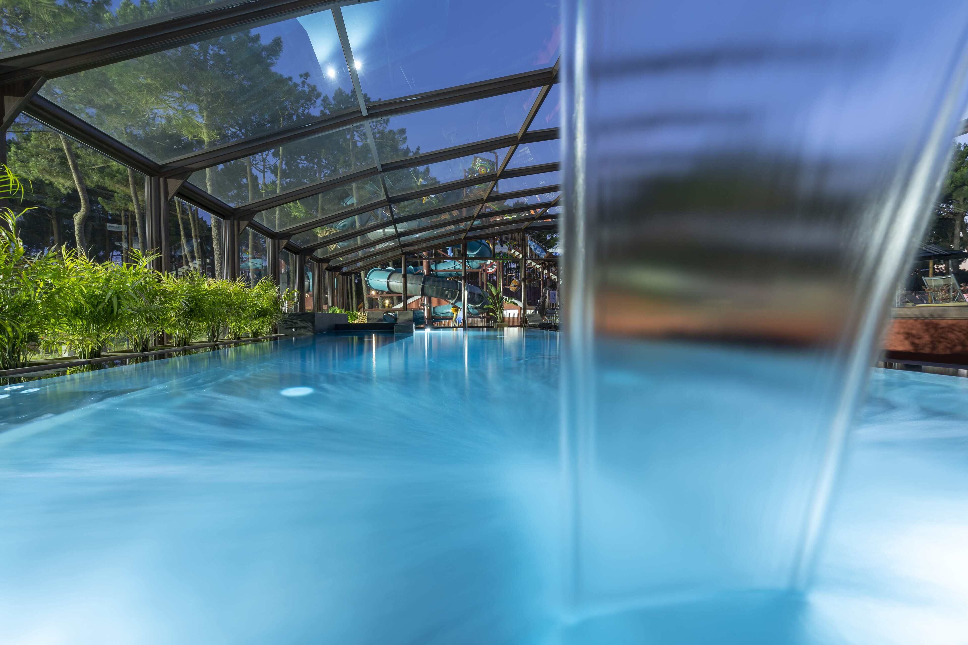 Indoor pool, seasonal outdoor pool, pool umbrellas