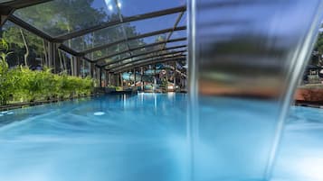 Indoor pool, seasonal outdoor pool, pool umbrellas