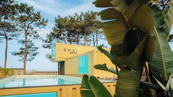 Indoor pool, seasonal outdoor pool, pool umbrellas