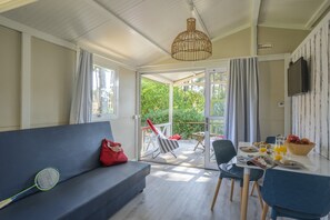 Bungalow, 1 Bedroom, Kitchenette (2 pax) | Living area | TV, table tennis, books - Ohai Nazaré Outdoor Resorts (Nazaré)