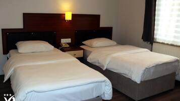 Chambre Affaires Double ou avec lits jumeaux | Matelas Tempur-Pedic, minibar, coffres-forts dans les chambres