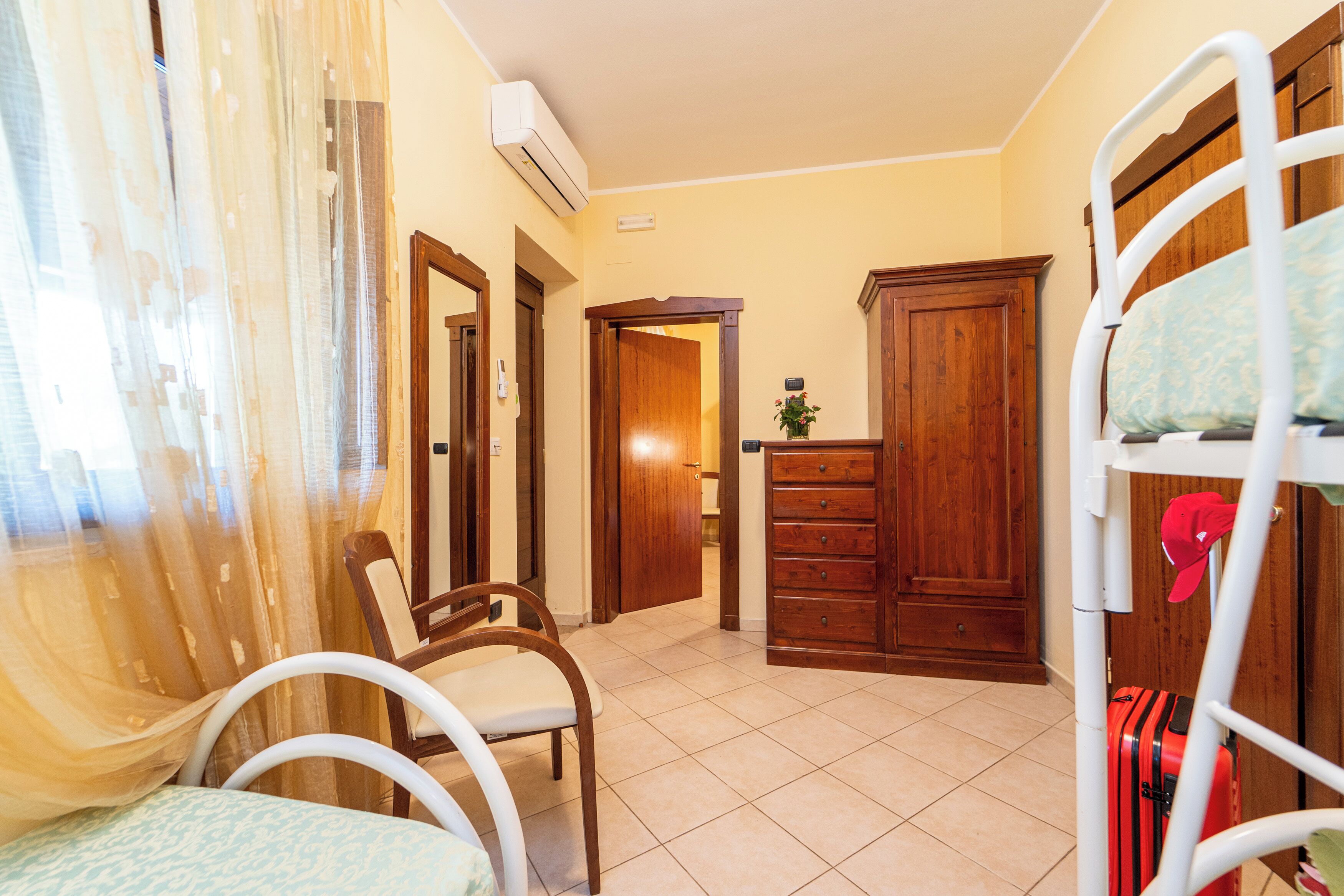 family room, 2 bedrooms | 1 bedroom, minibar, in-room safe, desk