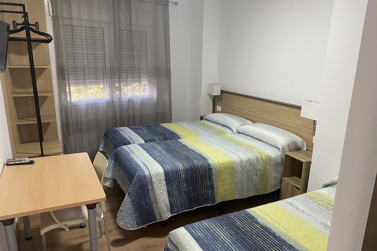 Chambre Triple, 3 lits une place