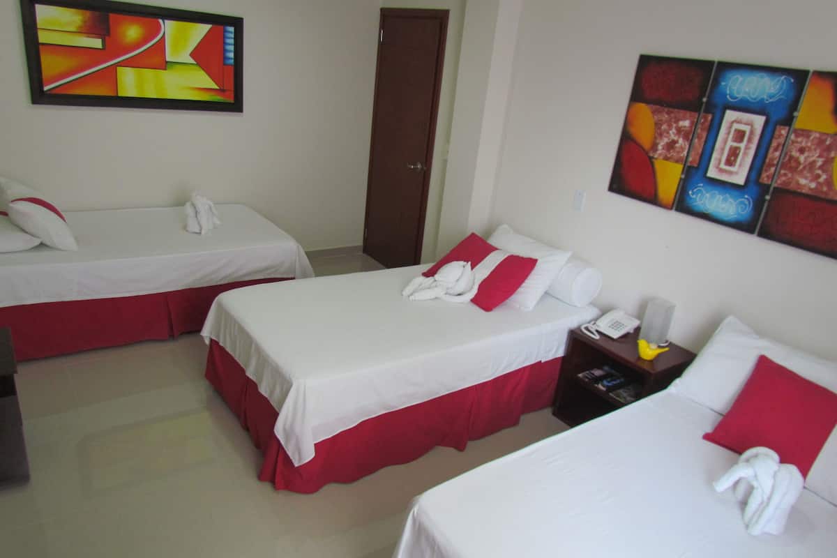 Triple Room | In-room safe, individually decorated, desk, iron/ironing board