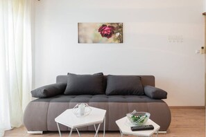 Luxury Apartment, 1 Bedroom, Balcony, Sea View | Living area | 62-cm LCD TV with satellite channels, TV
