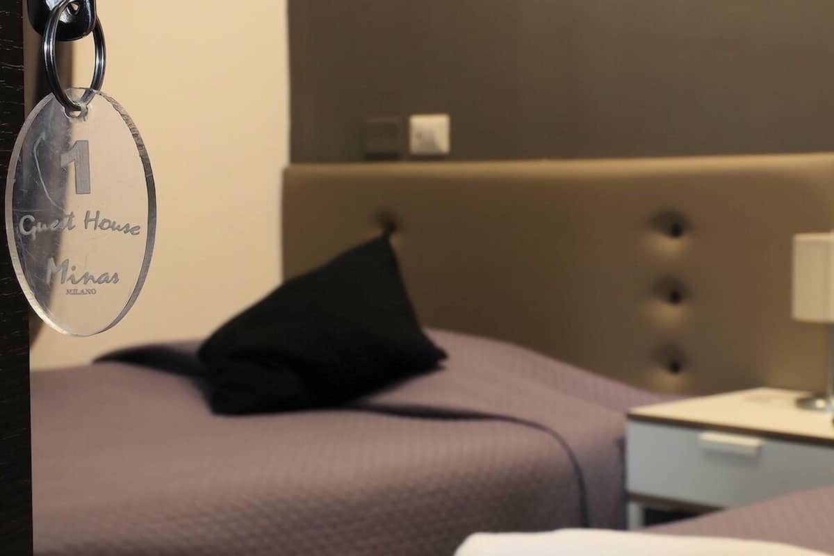 Twin kamer | Een minibar, individueel gemeubileerd, een bureau, een laptopwerkplek