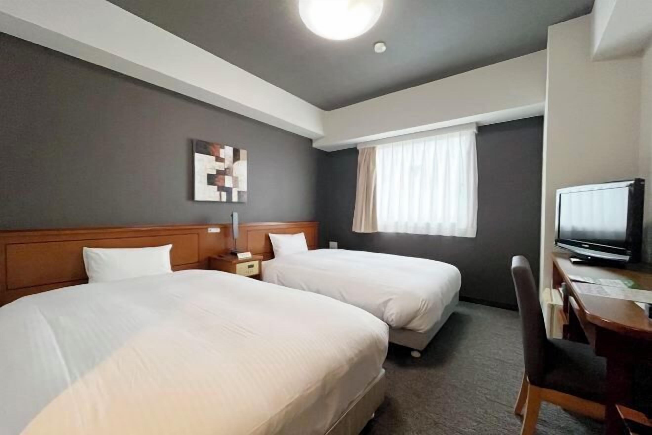 مكواة/لوح كي وواي فاي مجانًا وملاءات أسرّة