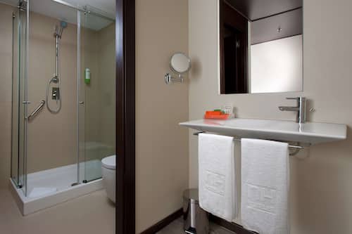 Eco-friendly toiletries, hair dryer, towels, soap
