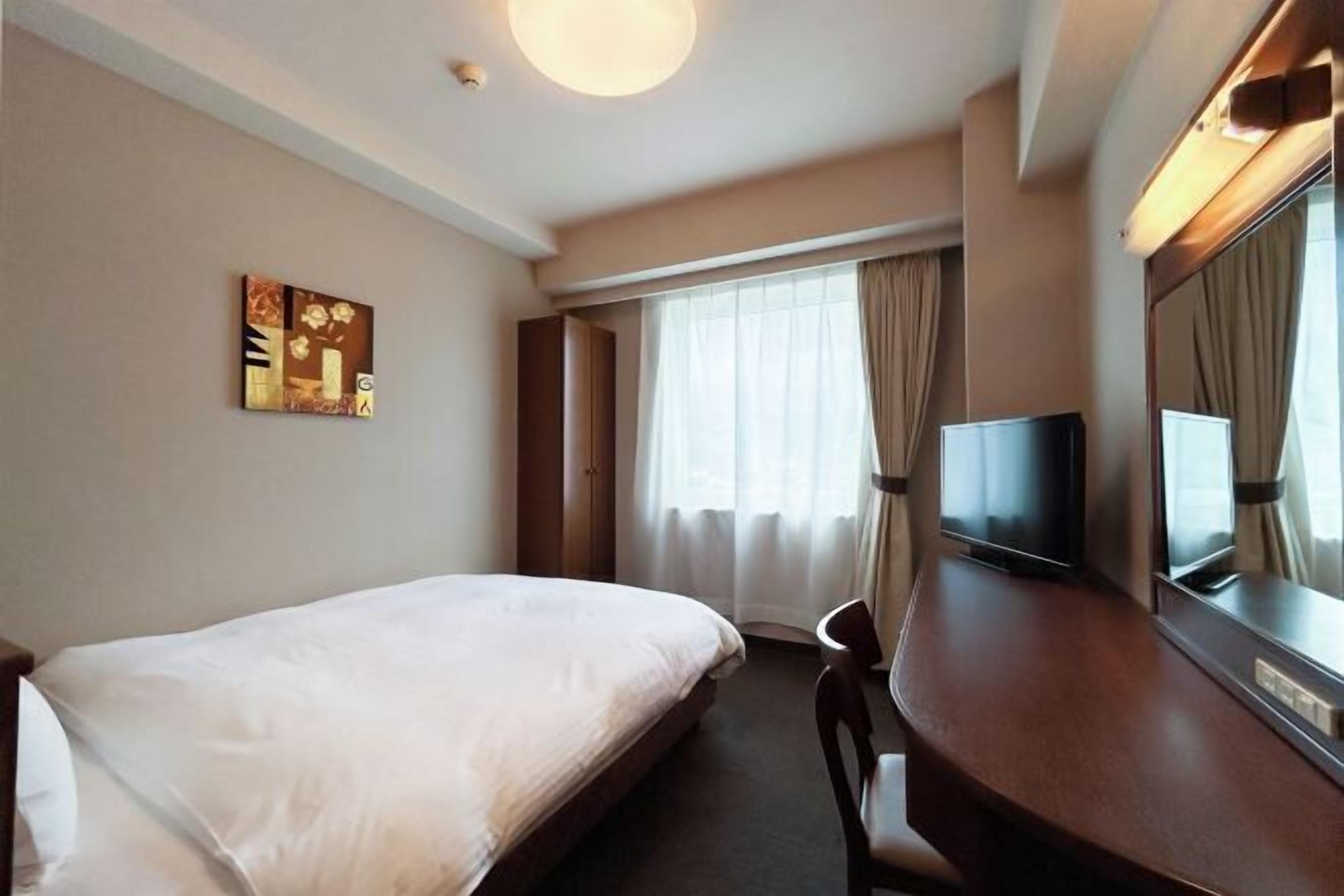 Desk, free WiFi, bed sheets