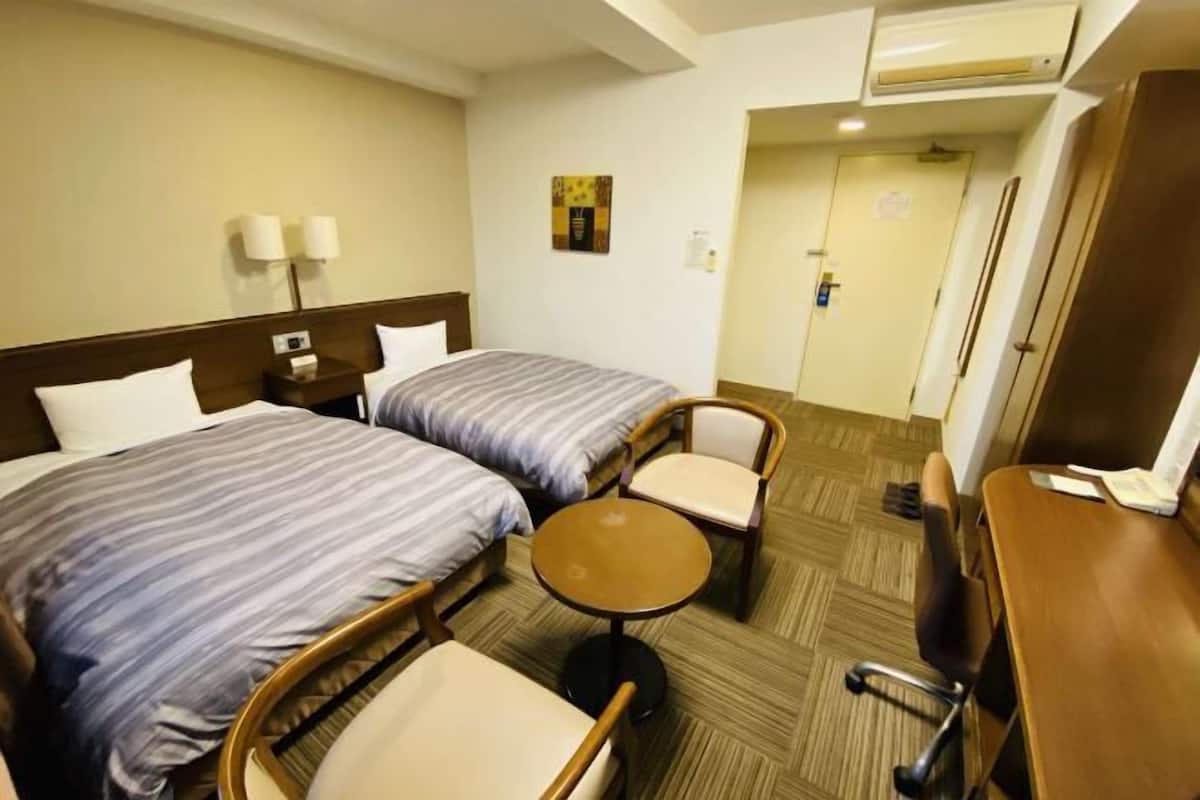 Desk, free WiFi, bed sheets