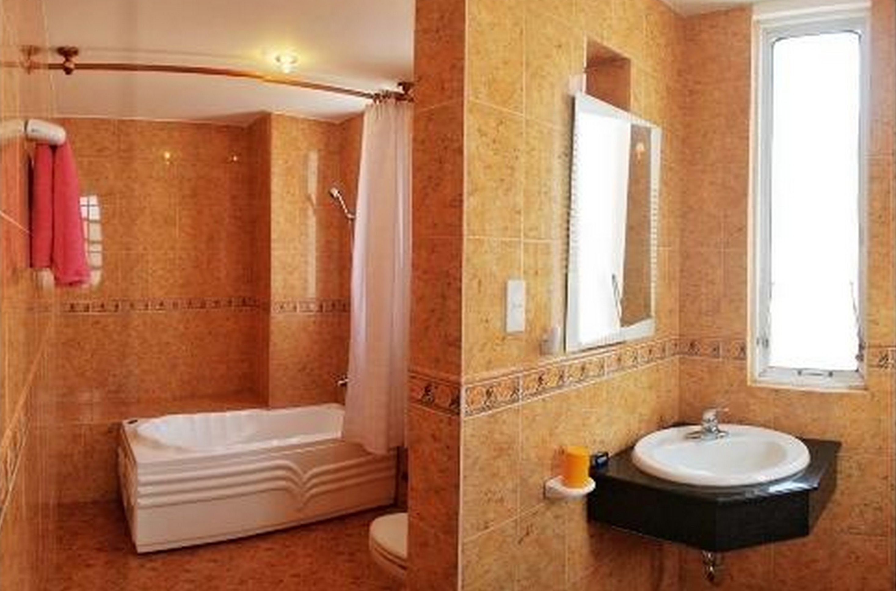 separate bathtub and shower, designer toiletries, hair dryer, slippers