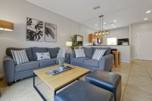 50-inch LCD TV with cable channels, TV - Encantada Resort Vacation Townhomes by IDILIQ (Kissimmee)