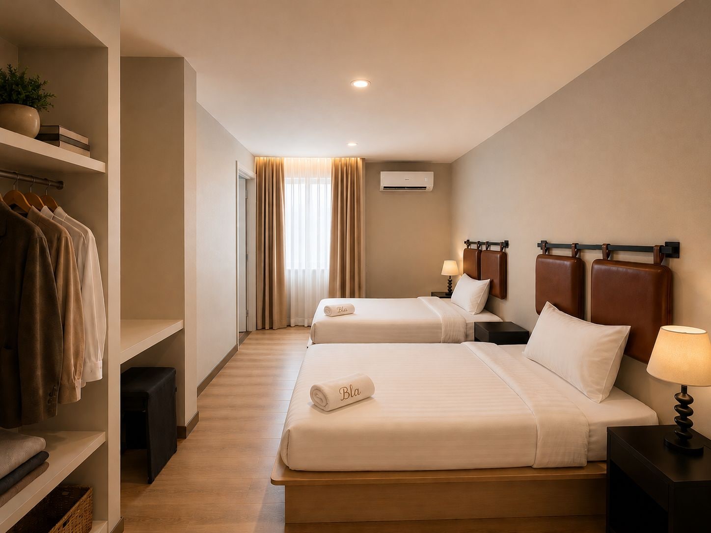 A hotel room with two beds, a wardrobe, a bedside table with a lamp, and a window with curtains.