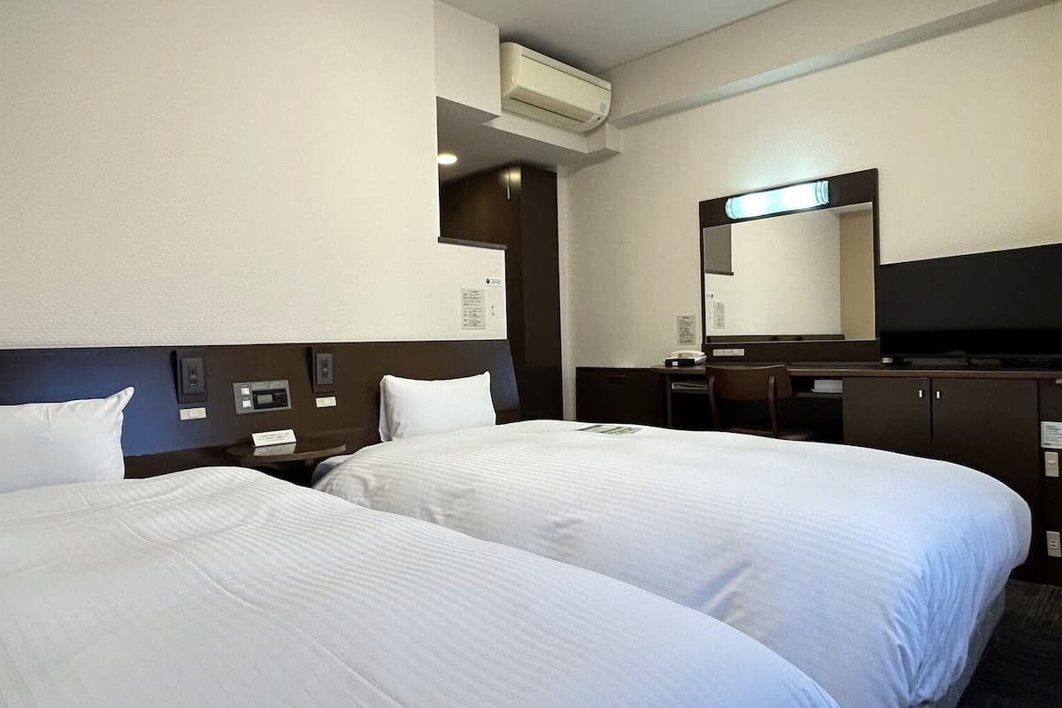 Desk, iron/ironing board (on request), WiFi (free), bed sheets