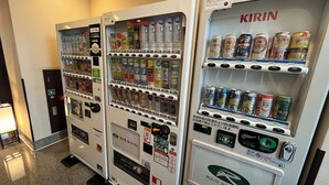 Vending machines with various beverages and snacks, including Kirin beer and energy drinks. - Hotel Route-Inn Gotenba Ekiminami (Gotemba)