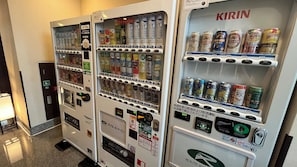 Vending machines with various beverages and snacks, including Kirin beer and energy drinks. - Hotel Route-Inn Gotenba Ekiminami (Gotemba)