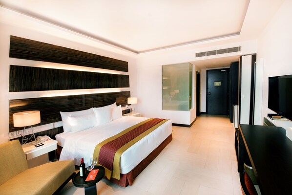 Premium bedding, down comforters, Select Comfort beds, minibar