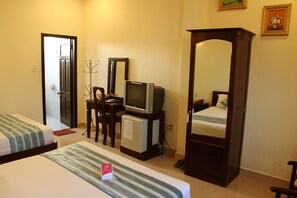 Minibar, desk, blackout curtains, iron/ironing board