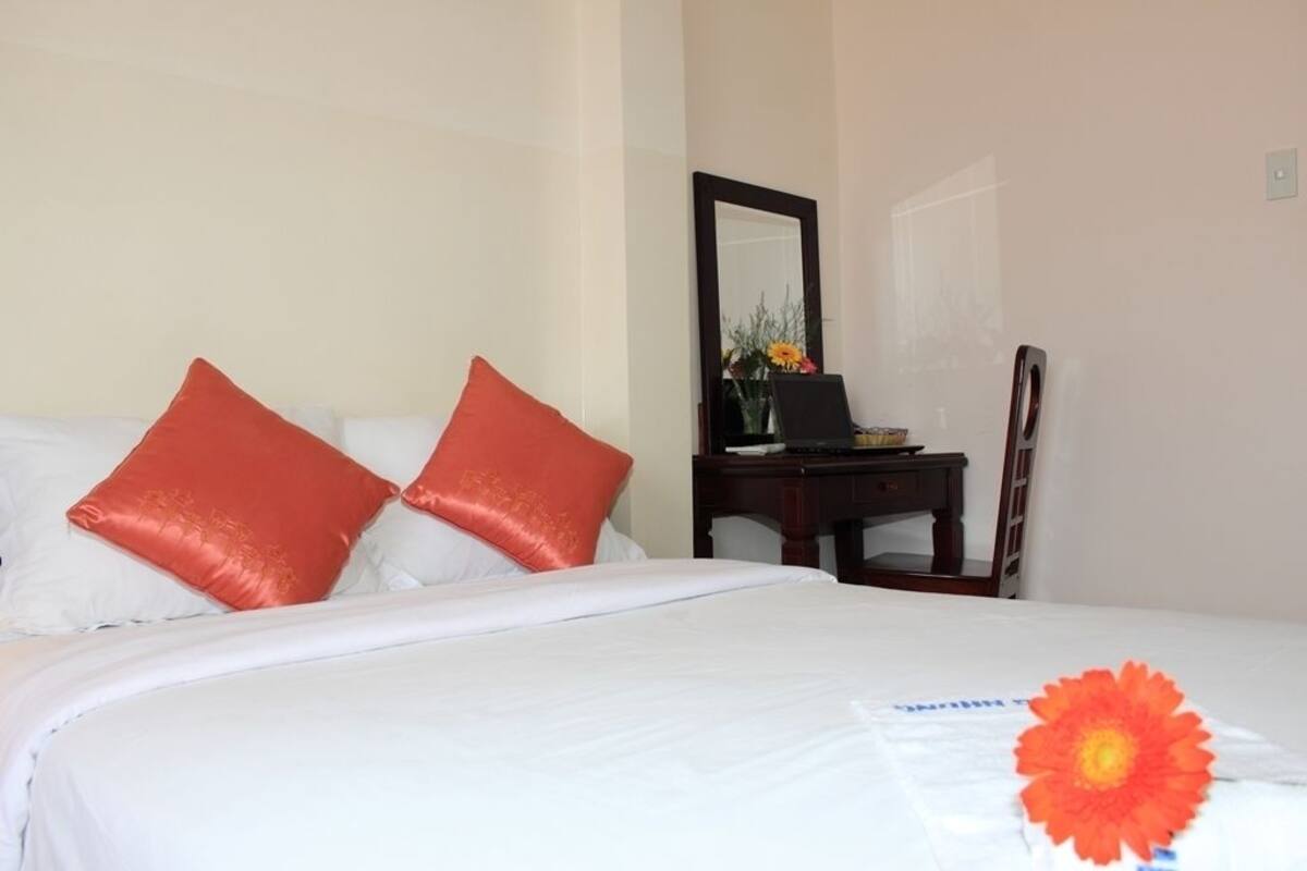 Deluxe Double Room | Minibar, desk, blackout curtains, iron/ironing board (on request)