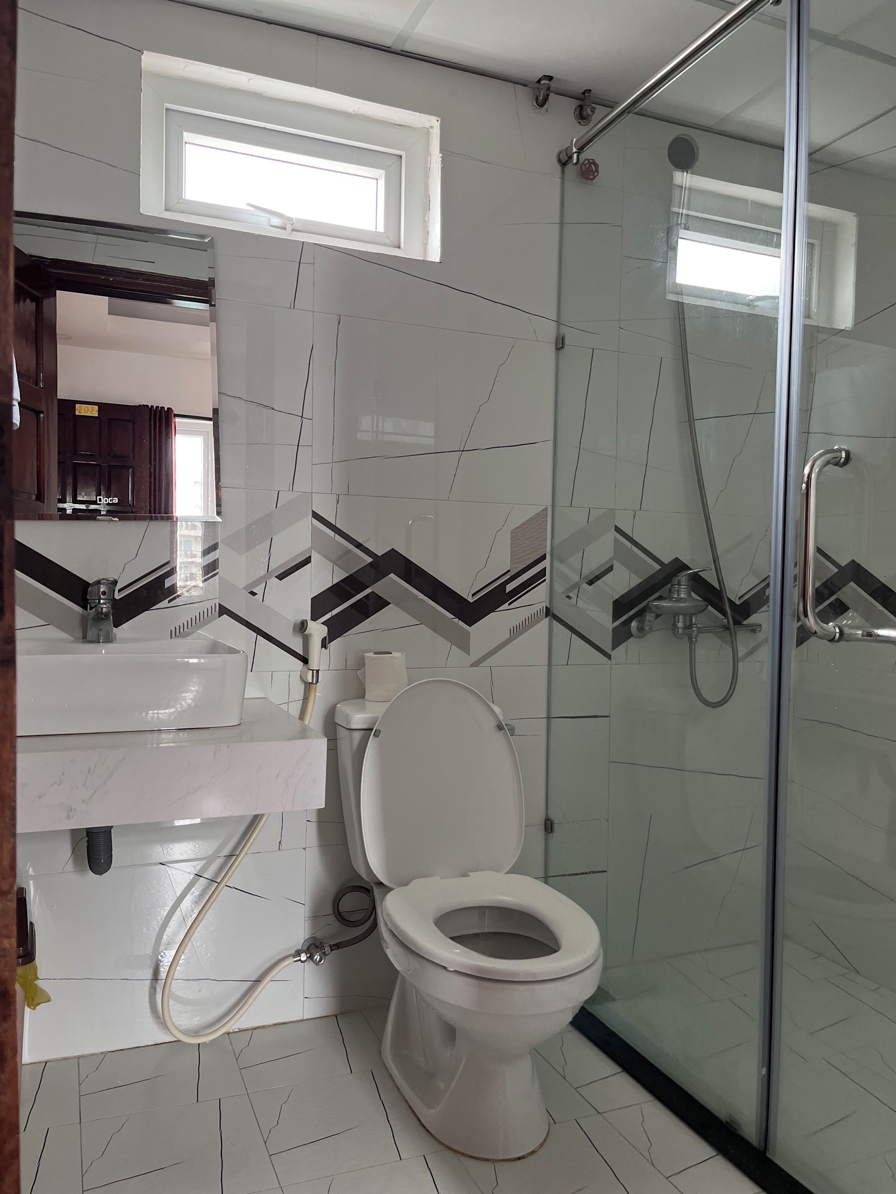 shower, rainfall showerhead, designer toiletries, hair dryer