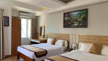 Superior Triple Room | Pillowtop beds, minibar, in-room safe, individually decorated