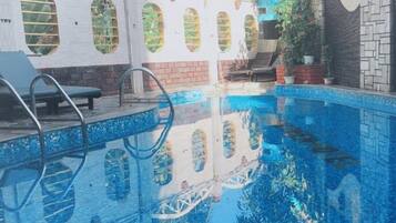 Outdoor pool, open 8:30 AM to 8:30 PM, sun loungers