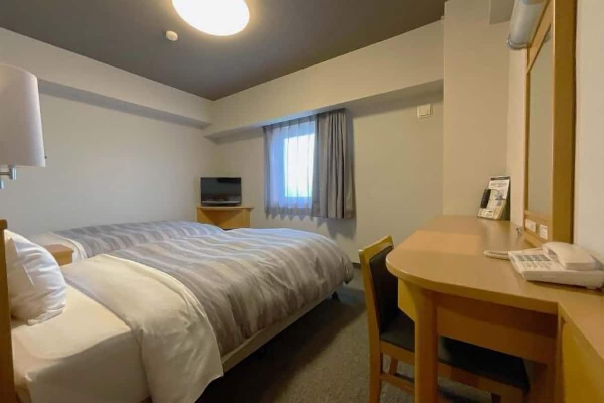 Desk, free WiFi, bed sheets