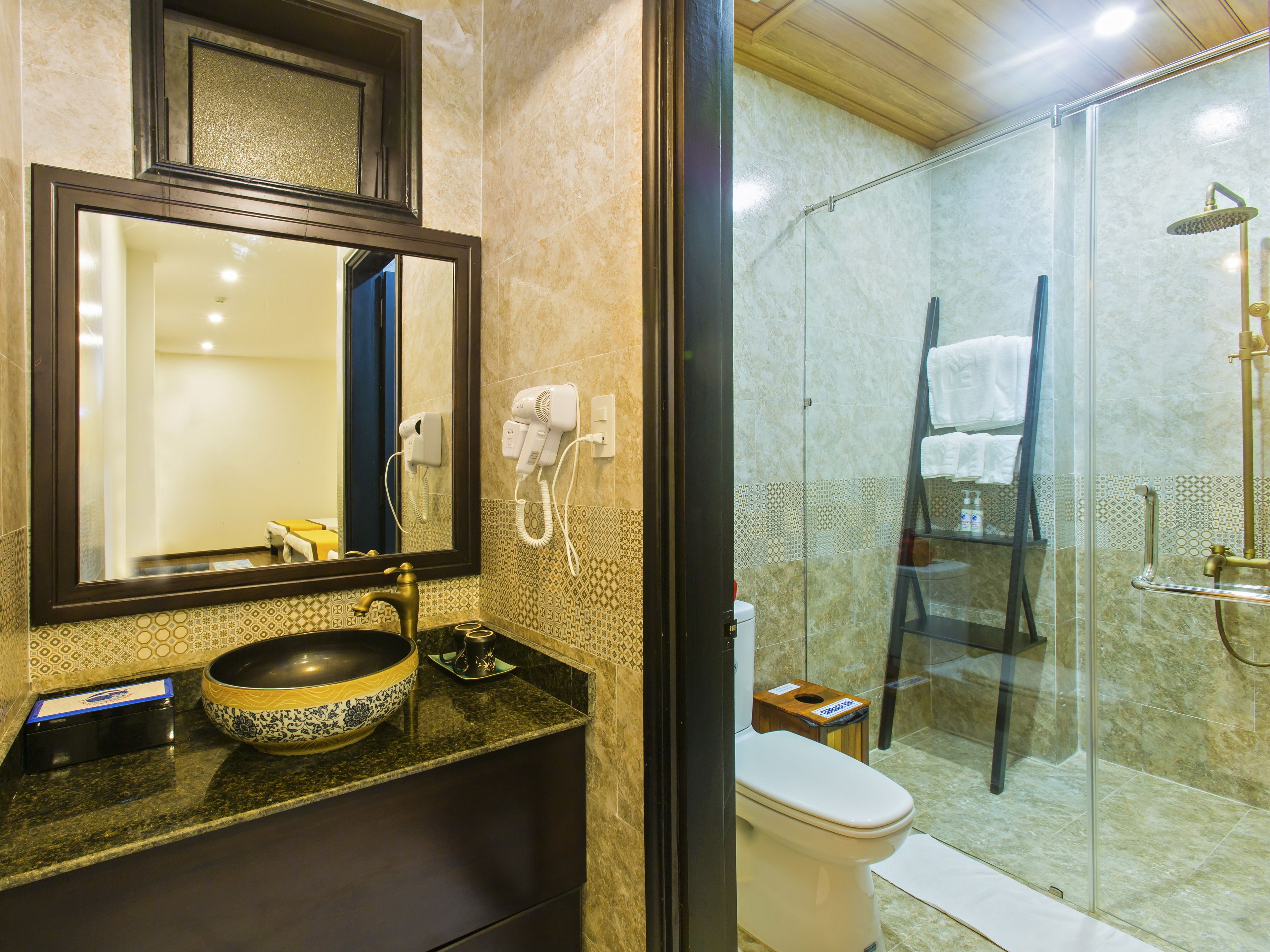 free toiletries, hair dryer, slippers, bidet