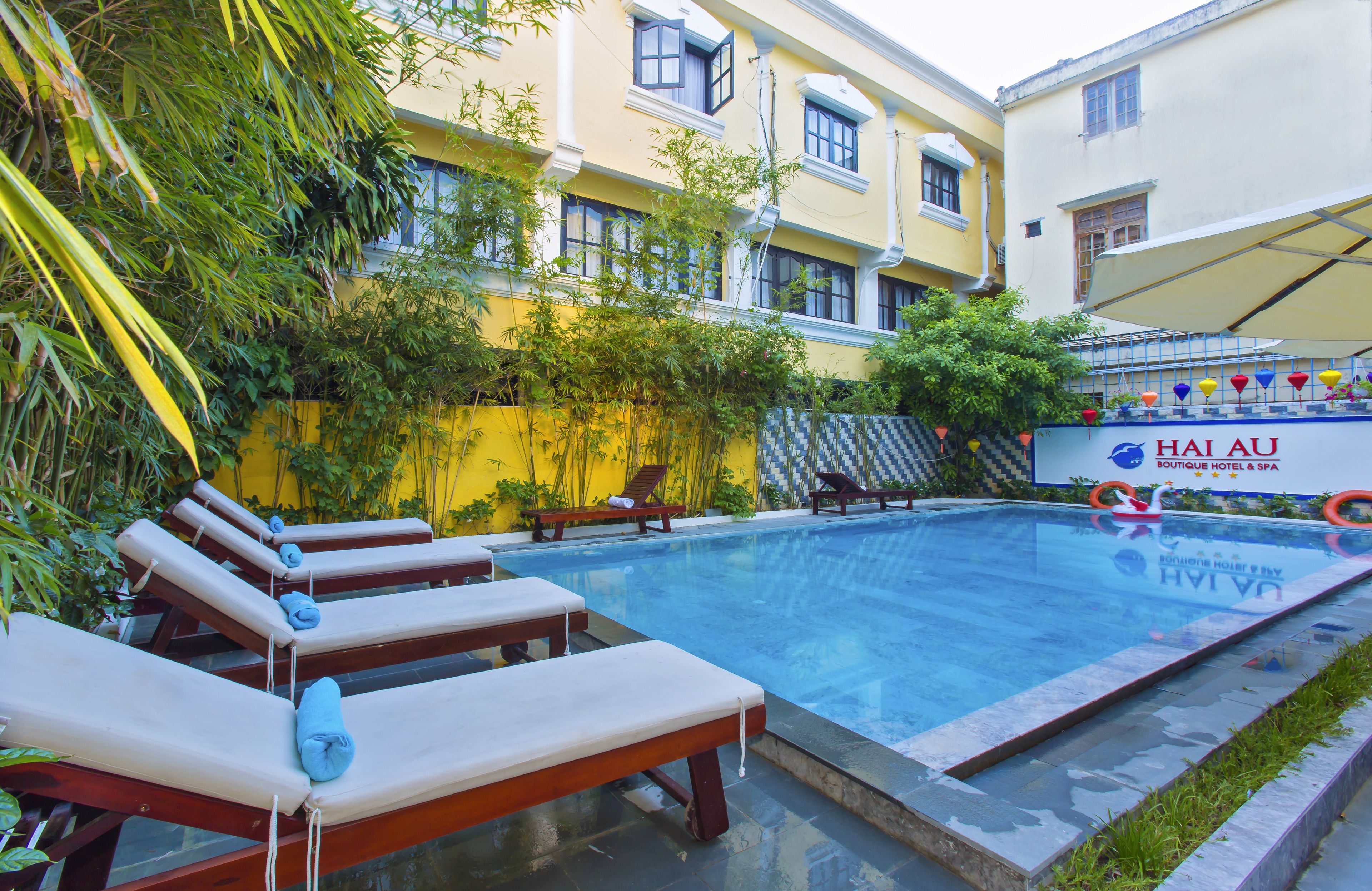 outdoor pool, pool umbrellas, pool loungers