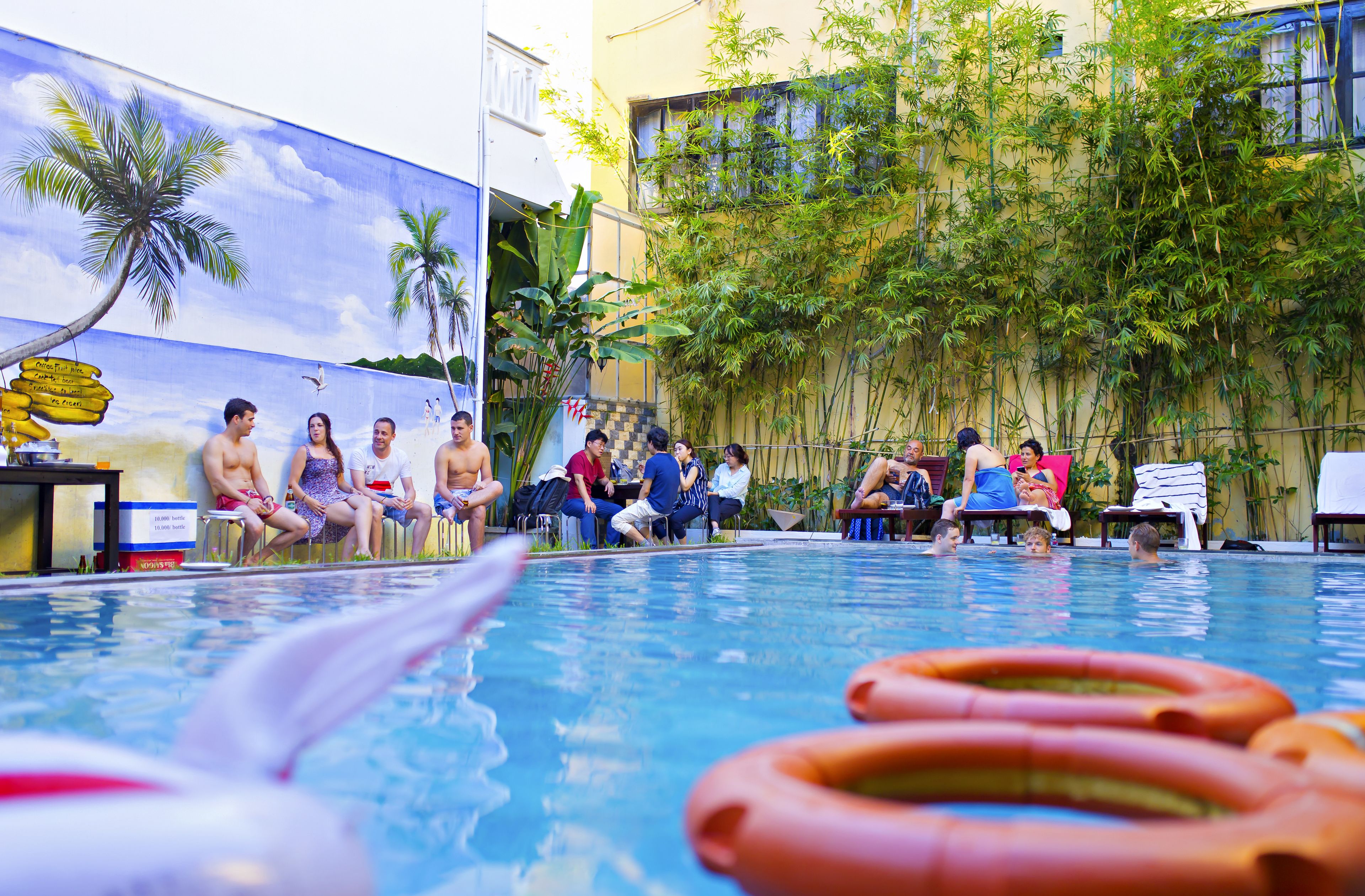 outdoor pool, pool umbrellas, pool loungers