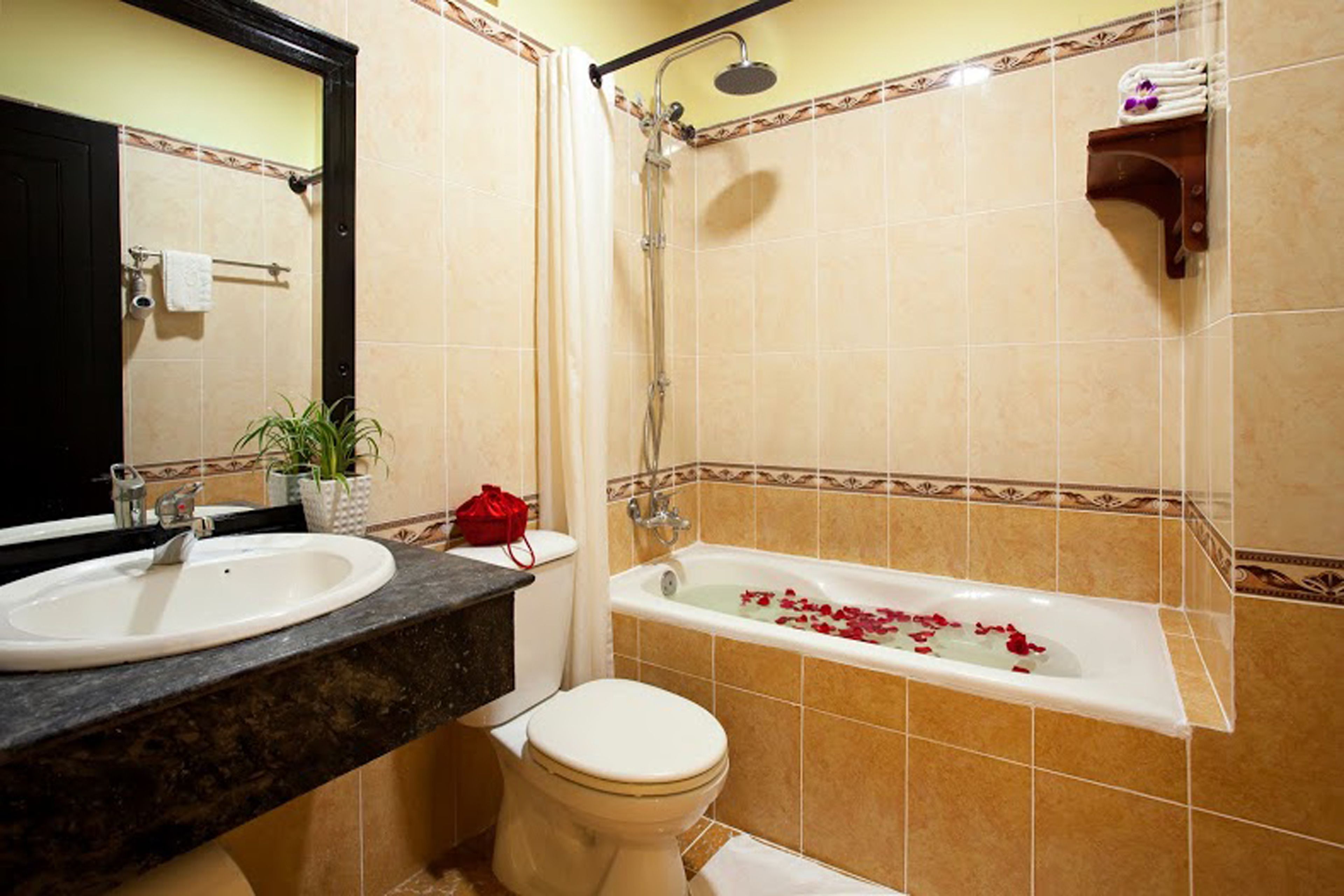 free toiletries, hair dryer, slippers, bidet