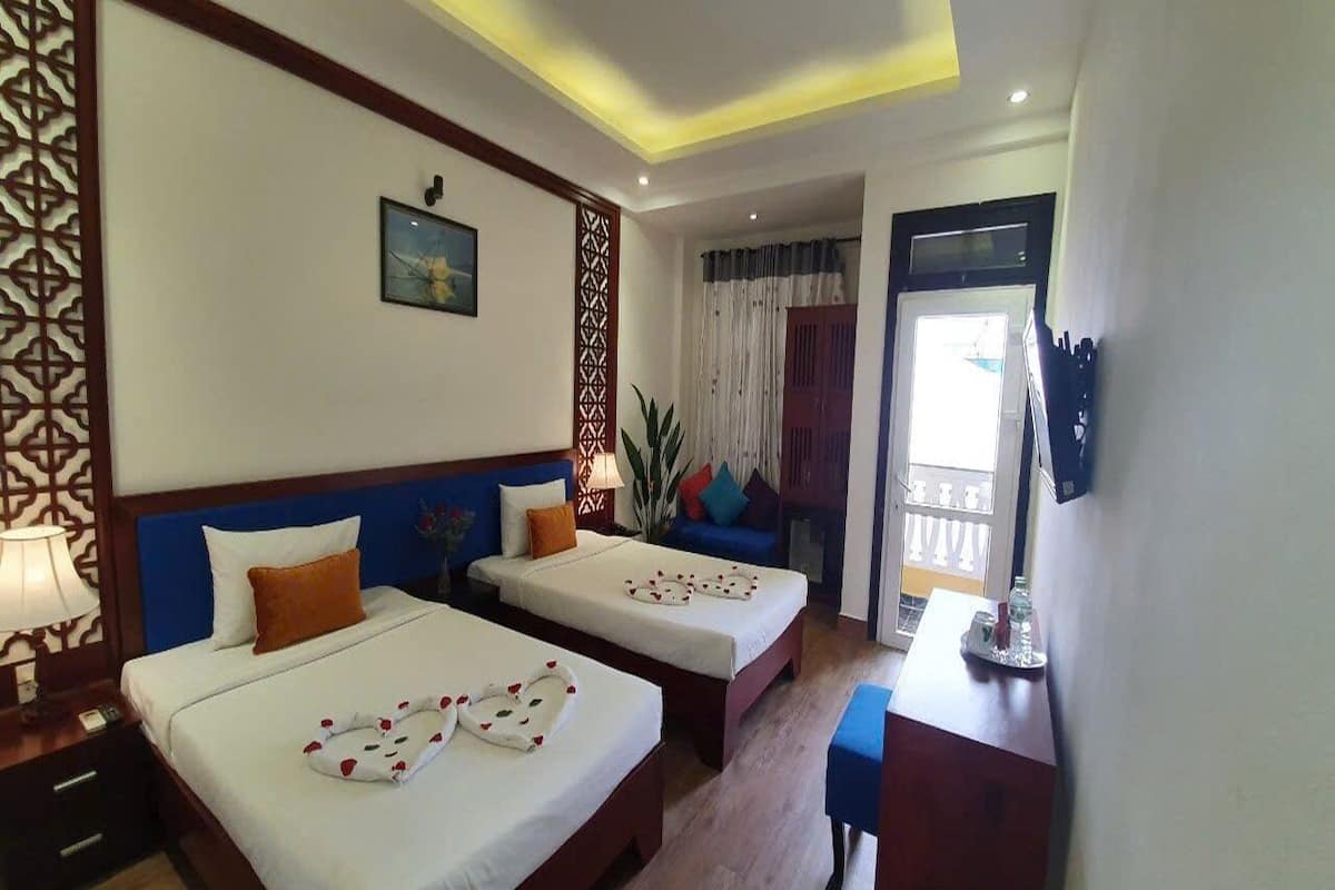 Phòng 2 giường đơn Deluxe | Minibar, két bảo mật tại phòng, bàn, phòng cách âm