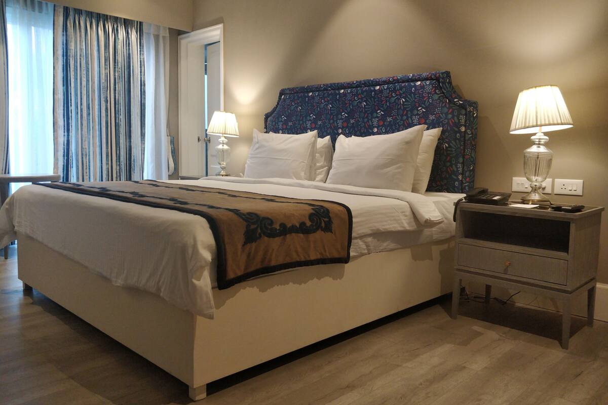 classic room | 1 bedroom, premium bedding, minibar, in-room safe