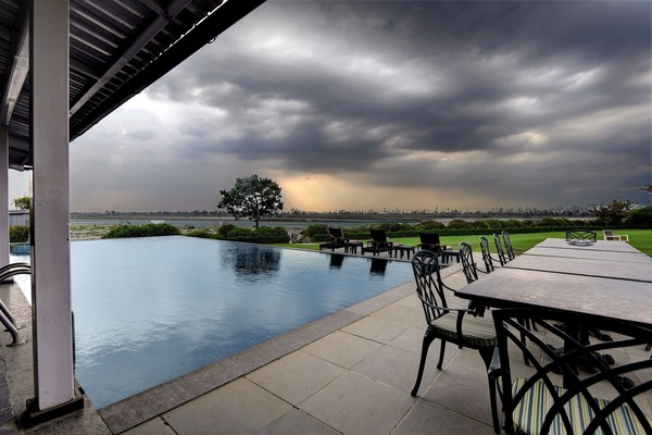 Outdoor pool, sun loungers, lifeguards on site