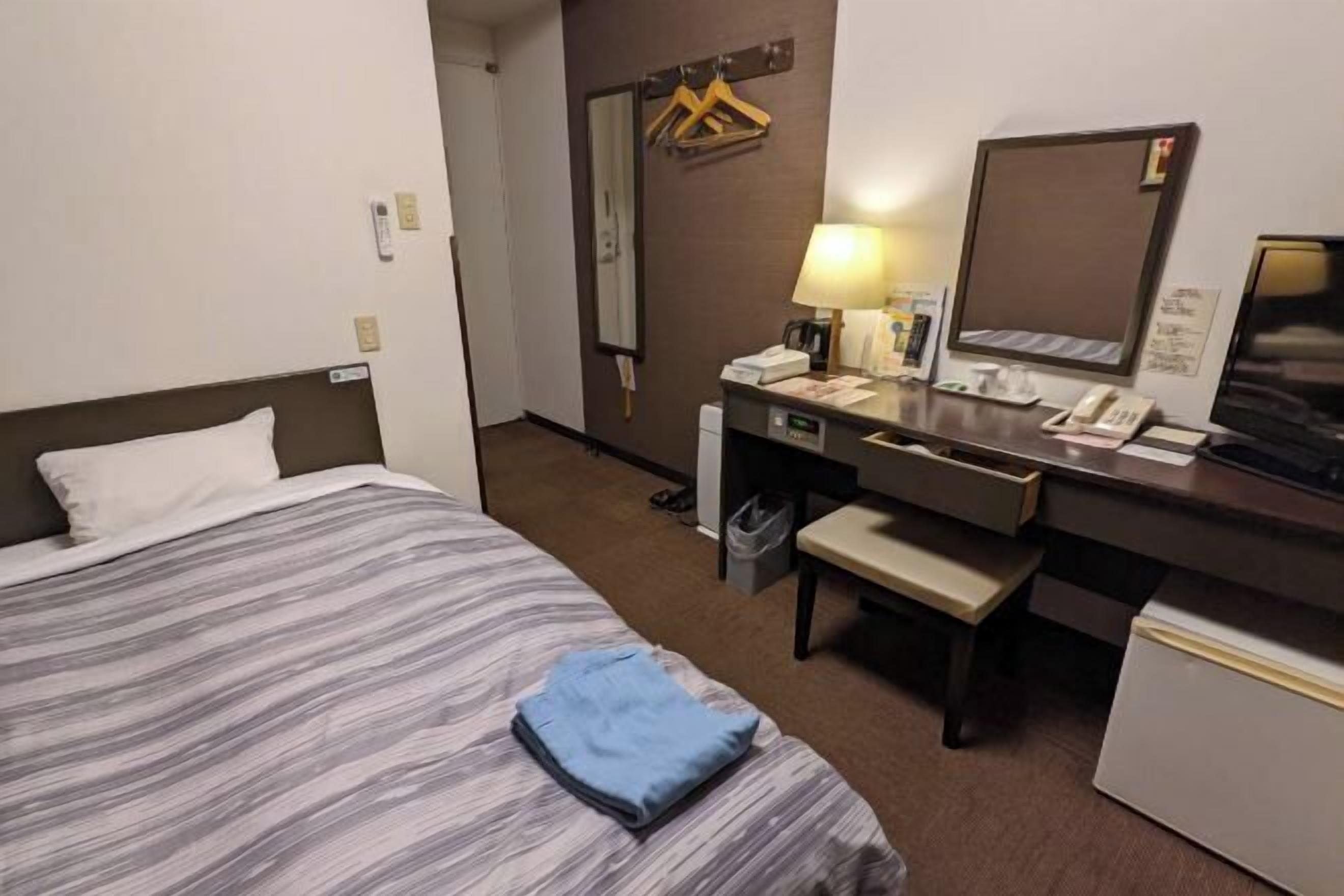 Desk, free WiFi, bed sheets