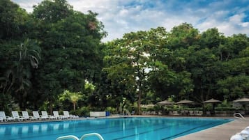 Outdoor pool, open 9:00 AM to 9:00 PM, pool umbrellas, sun loungers