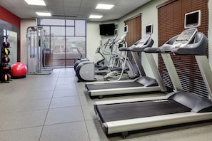 Stay fit on the go with our well-equipped gym featuring treadmills, elliptical machines, and free weights.