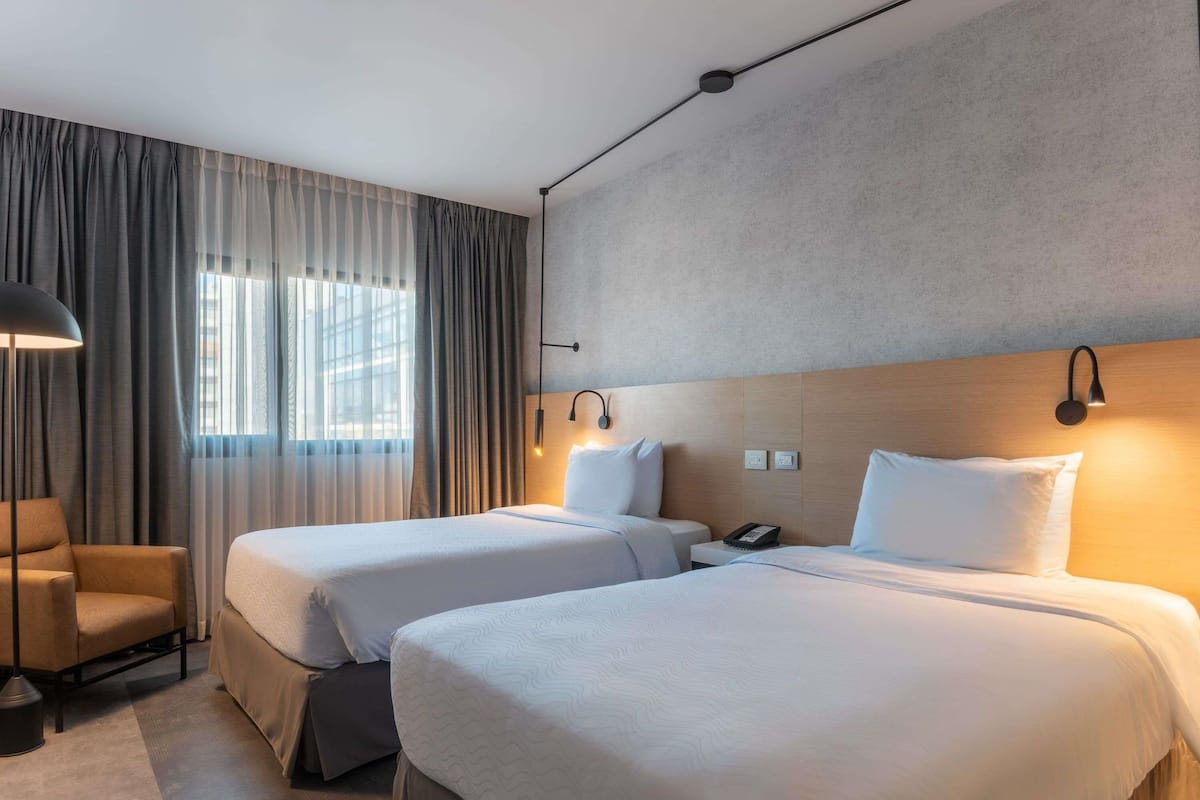 Standard Room, 2 Twin Beds | Minibar, in-room safe, desk, blackout drapes