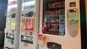 A vending machine with various drink options and snacks. - Hotel Route Inn Hitachitaga (Hitachi)