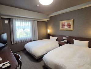 Desk, free WiFi, bed sheets
