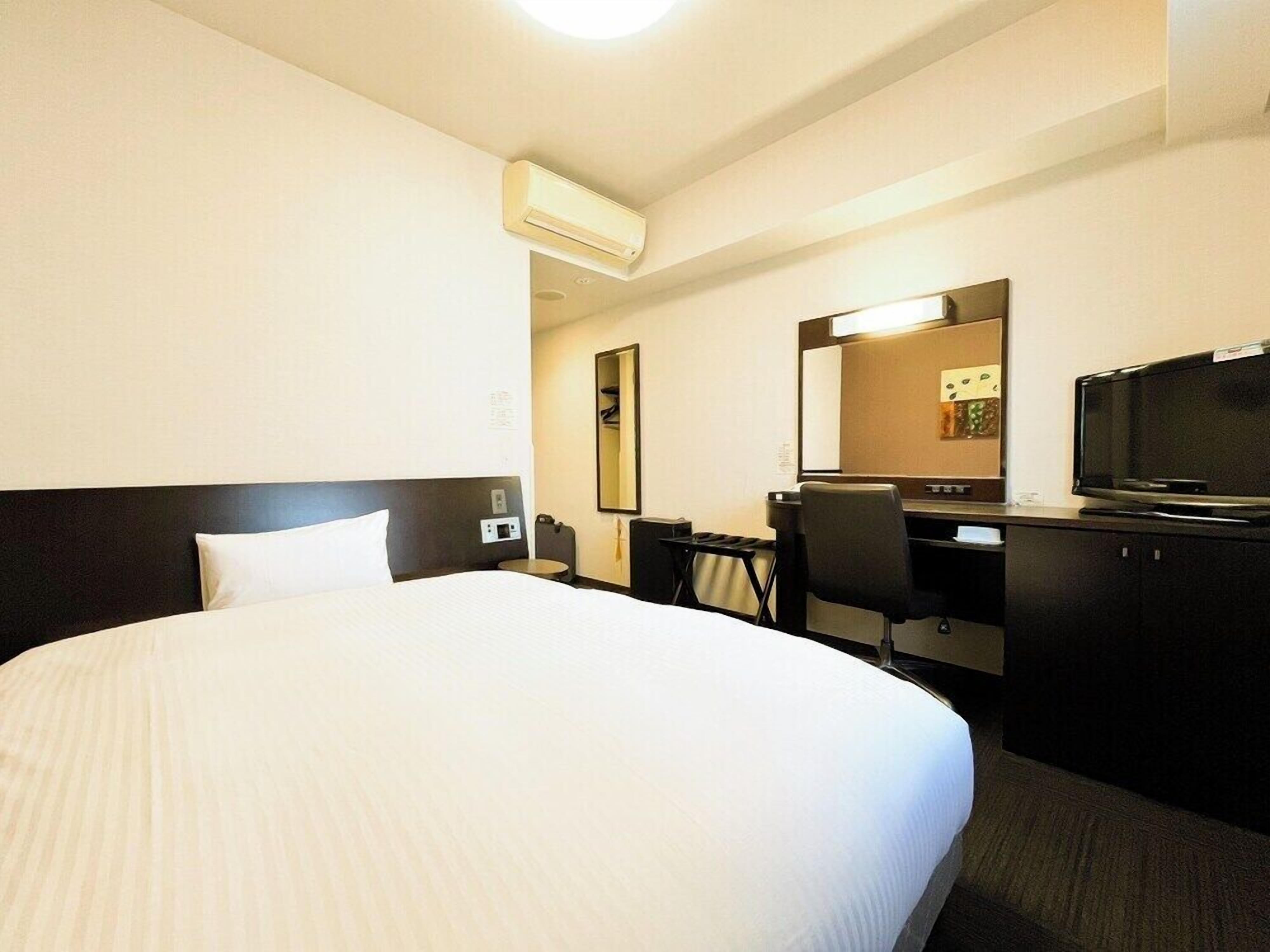Desk, free WiFi, bed sheets