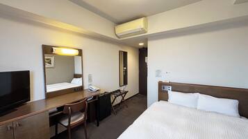 Desk, free WiFi, bed sheets