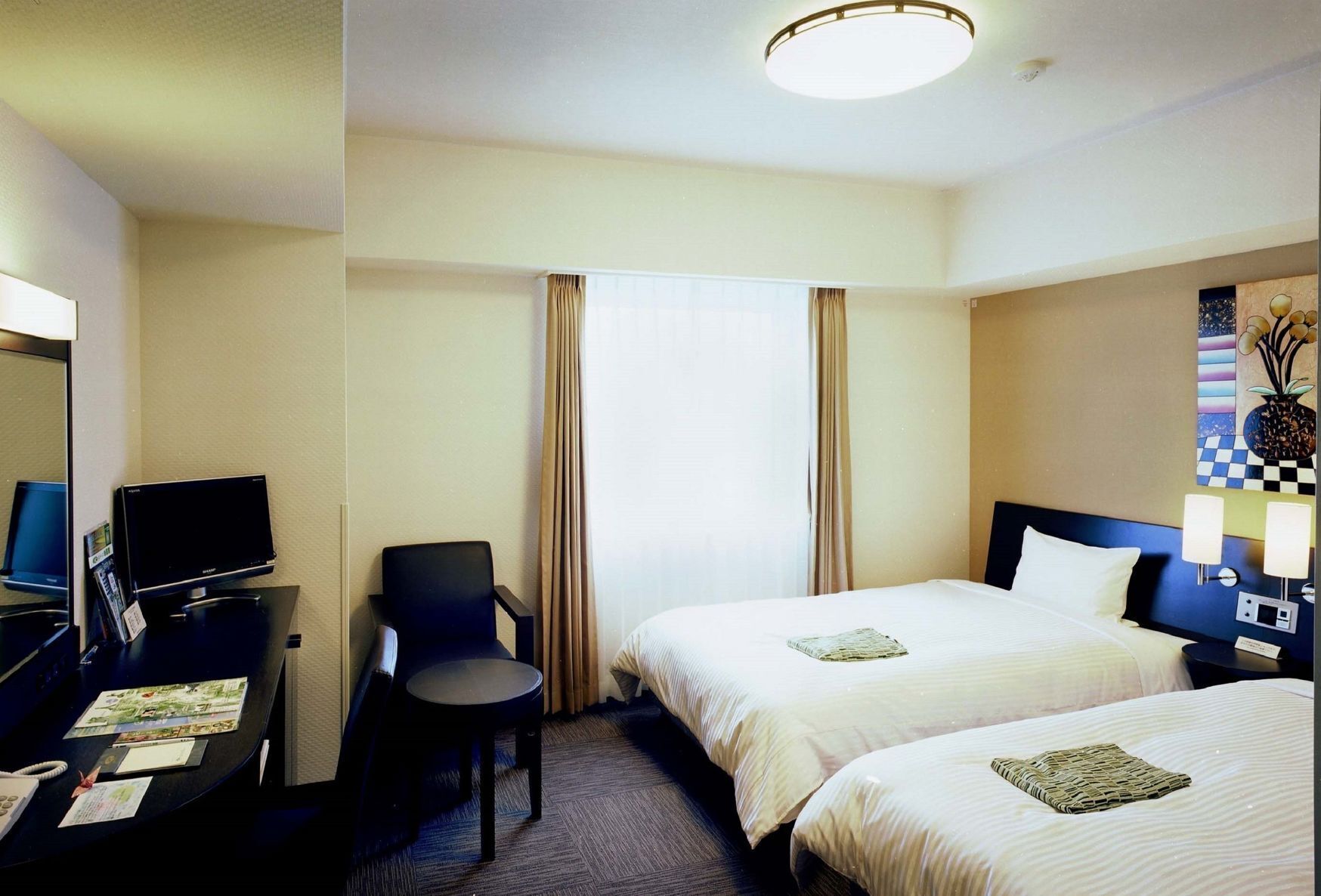 Desk, free WiFi, bed sheets