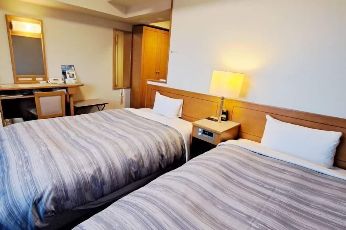 Desk, free WiFi, bed sheets