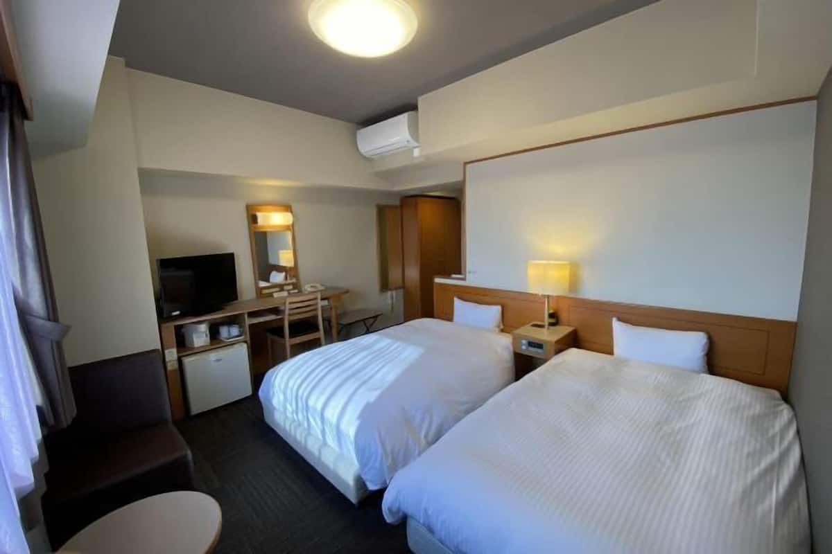 Desk, free WiFi, bed sheets